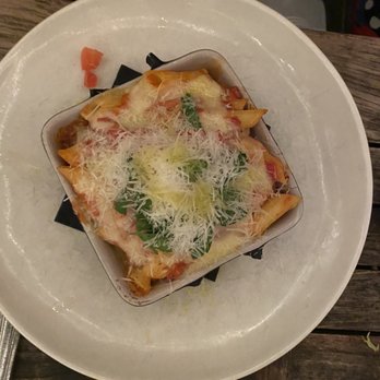 Olive & June - Baked Rigatone - sweet sausage ragu, root vegetables, fontina, Parmesan - Italian Near Me - Austin, Texas Olive & June - Baked Rigatone - sweet sausage ragu, root vegetables, fontina, Parmesan - Italian Near Me - Austin, Texas