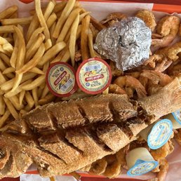 Snapper, fries, and fried shrimp Snapper, fries, and fried shrimp