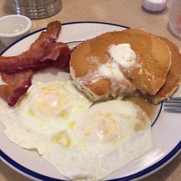The eggs were ordered over easy & perfect. Pancakes little underdone. Overall good.
