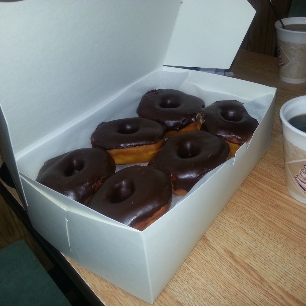 Sherrys Bakery - A dozen of chocolate covered donuts. - Bakeries Near Me - Dunn, North Carolina Sherrys Bakery - A dozen of chocolate covered donuts. - Bakeries Near Me - Dunn, North Carolina