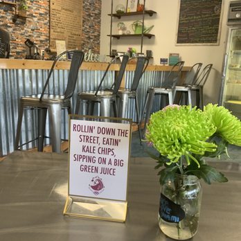 Swami Juice - Cool, funny and little signs at the seating area. Stool bar to watch them make your food - Juice Bars & Smoothies Near Me - Plantation, Florida