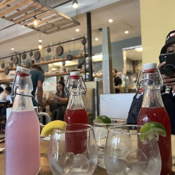 First Watch - 2 Pomegranate Sunrise, 1 Spiked Lavender Lemonade - Breakfast & Brunch Near Me - Lauderhill, Florida First Watch - 2 Pomegranate Sunrise, 1 Spiked Lavender Lemonade - Breakfast & Brunch Near Me - Lauderhill, Florida