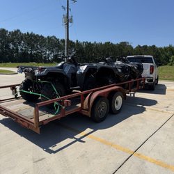 Covington Powersports - 3 ATV's on a trailer and a truck