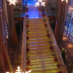 Robin's Custom Travel - This is the grand stair case inside of a cruise ship that Robin's Custom Travel booked Dec 2008.