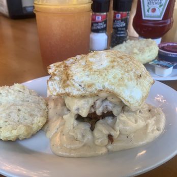 Maple Street Biscuit Company - Mobile - Hacked "layer cake " with potato fritters, mushroom gravy and over easy egg. - Breakfast & Brunch Near Me - Mobile, Alabama Maple Street Biscuit Company - Mobile - Hacked "layer cake " with potato fritters, mushroom gravy and over easy egg. - Breakfast & Brunch Near Me - Mobile, Alabama