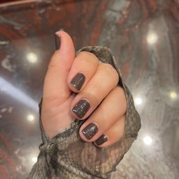 Dark brown gel manicure