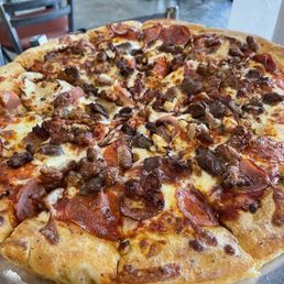Large Otis pizza on thick crust.