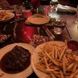Steak Au Poivre with Shoestring Fries & and espresso martini Steak Au Poivre with Shoestring Fries & and espresso martini