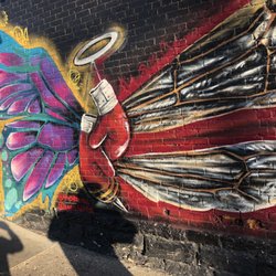 Float Like A Butterfly, Sting Like a Bee Mural