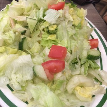 Sheeba Restaurant - This is what they call a salad. A plate of ice berg lettuce with a few tomatoes and cucumbers. - Middle Eastern Near Me - Dearborn, Michigan Sheeba Restaurant - This is what they call a salad. A plate of ice berg lettuce with a few tomatoes and cucumbers. - Middle Eastern Near Me - Dearborn, Michigan