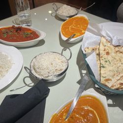 Curries - Two butter chickens (one medium, one mild) and a medium lamb vindaloo
