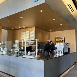 a man working at a counter a man working at a counter