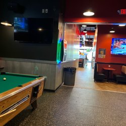 Tailgate Sports Bar & Grille - From the bar to the restaurant view.