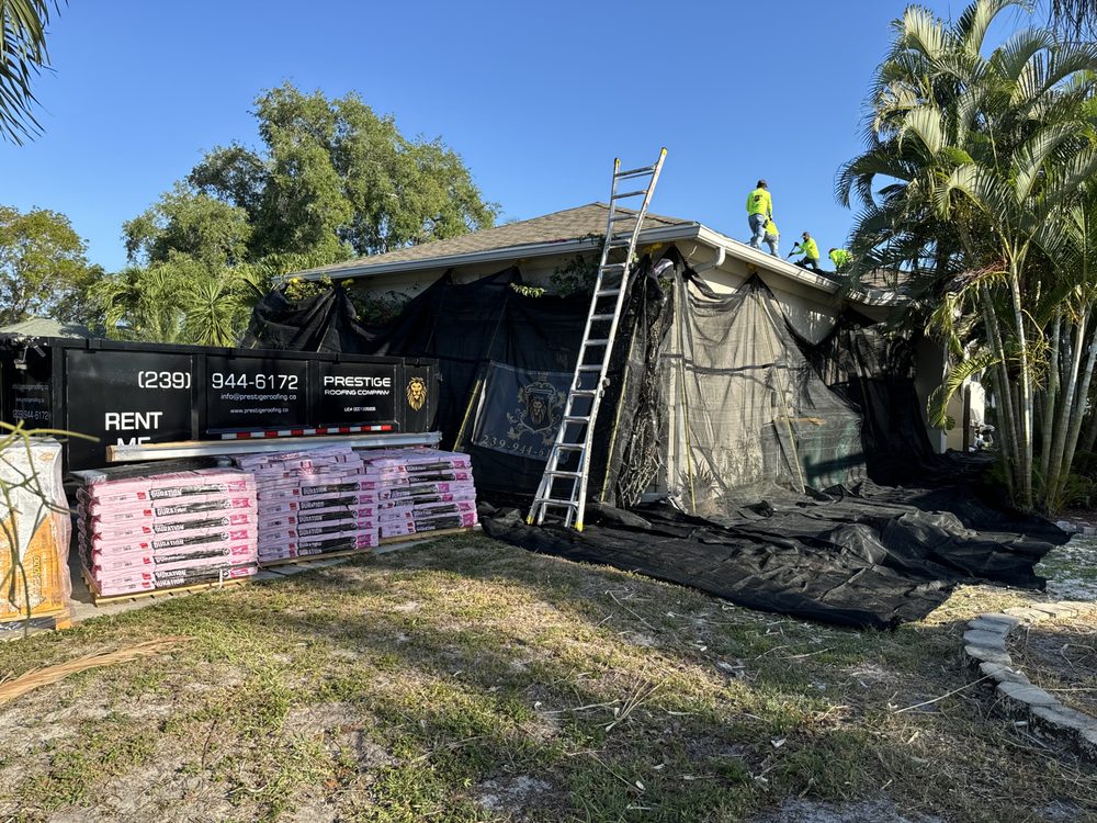 Slide of Prestige Roofing Company