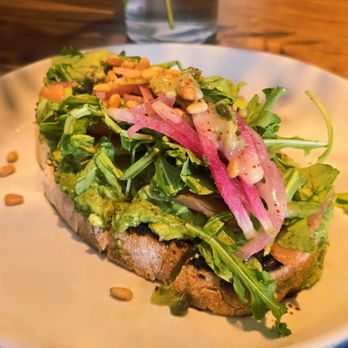 North Italia - Smoked Salmon Avocado Toast - Caper relish, watermelon radish, toasted pine nut, pickled red onion - Italian Near Me - Canoga Park, California North Italia - Smoked Salmon Avocado Toast - Caper relish, watermelon radish, toasted pine nut, pickled red onion - Italian Near Me - Canoga Park, California