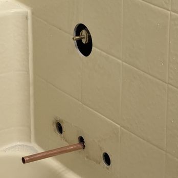 Dream Team Plumbing - Holes from old leaking shower faucet that was beyond repair. What it looked like after he removed them. - Plumbing Near Me - Mesa, Arizona