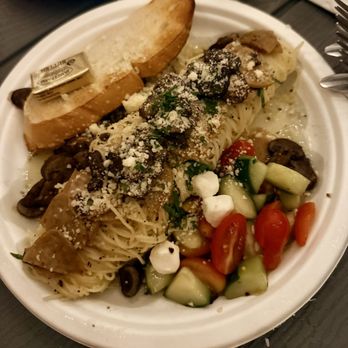Panzas Tapping Italy - Porcini Mushroom pasta with sausage, cucumber tomato mozzarella salad and toast - Specialty Food Near Me - Waxahachie, Texas