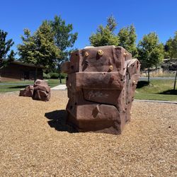 American Legion Community Park - Rocks and bathroom in back ground