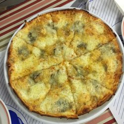 Pizzeria Pinocho - Cuatro Quesos , especialidad de la Casa
