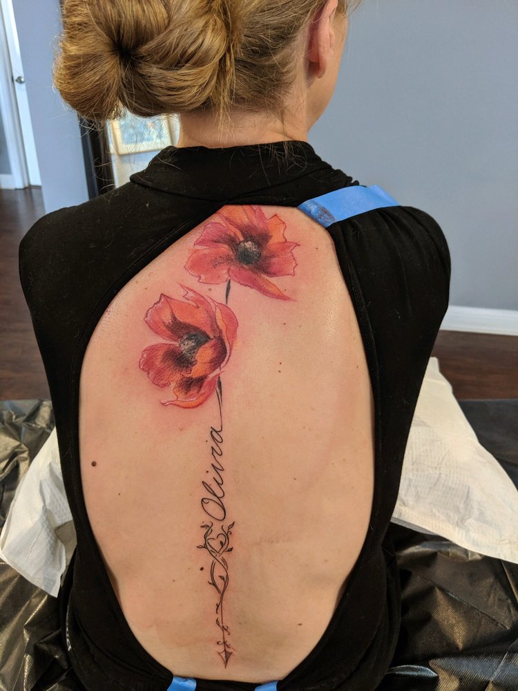 Wick Tattoo Logo