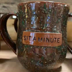 Rosie's Sit a Minute Cafe - They sell beautiful coffee mugs & other ceramics