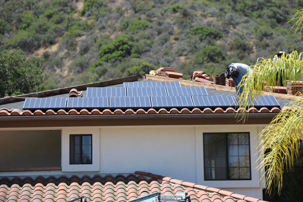 Slide of August Roofing & Solar
