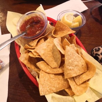 Liberty Cafe - a plate of tortilla chips and a bowl of salsa - American Near Me - Freer, Texas