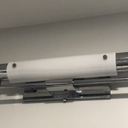 The finished sconce using a changeable  LED bulb.