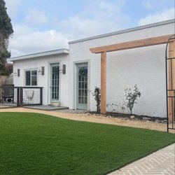 Turftenders Landscape - Artificial Turf, and Decomposed Granite pathway were installed. A simple trellis for customers climbing roses was also installed.