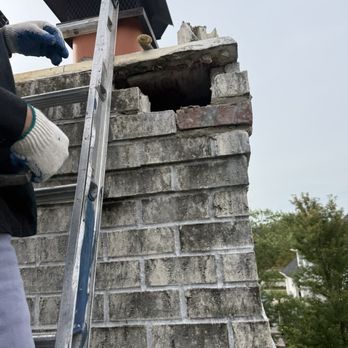 Nicholas Roofing & Tuckpointing - Repairs to the broken bricks and slab on top of chimney - Roofing Near Me Nicholas Roofing & Tuckpointing - Repairs to the broken bricks and slab on top of chimney - Roofing Near Me