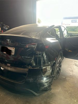 Tesla Model Y - Rear right side damage repairs from outside and inside
