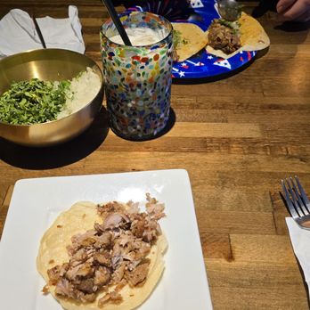 La Rioja Mexican Cuisine - Carnitas taco and my husband's cabeza tacos served on a random paper plate - Mexican Near Me - Auburn, Washington La Rioja Mexican Cuisine - Carnitas taco and my husband's cabeza tacos served on a random paper plate - Mexican Near Me - Auburn, Washington
