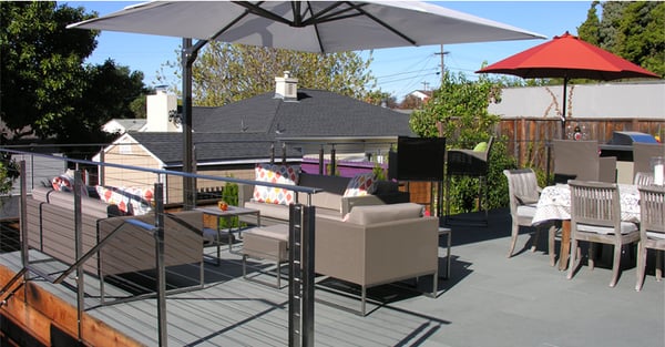 Mid-Century Modern El Cerrito Patio Deck & Outdoor Kitchen - This El Cerrito client wanted a stone deck with an outdoor kitchen. The backyard sloped away from the house so we built a deck frame, cable railing and an outdoor kitchen for a wonderful extension of their Mid-Century Modern house. Mid-Century Modern El Cerrito Patio Deck & Outdoor Kitchen - This El Cerrito client wanted a stone deck with an outdoor kitchen. The backyard sloped away from the house so we built a deck frame, cable railing and an outdoor kitchen for a wonderful extension of their Mid-Century Modern house.