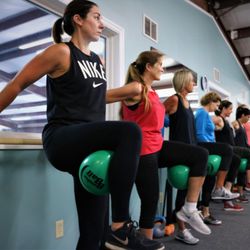 Sozo Family Fitness - Barre & bell class where our members are learning how to become more balanced and strong!
