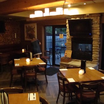 Mavericks Wood Grill - Dining room, facing the outside patio area. - American Near Me - Champlin, Minnesota Mavericks Wood Grill - Dining room, facing the outside patio area. - American Near Me - Champlin, Minnesota
