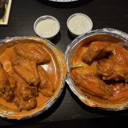 Jimmy Geez Sports Bar & Grill - Wings.. Spicy Garlic B & B and DTS (Jersey Style mixed w lemon pepper). Homemade blue cheese