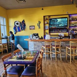 Pueblo Chico Mexican Grill - The inside of the restaurant, including front window and bar.