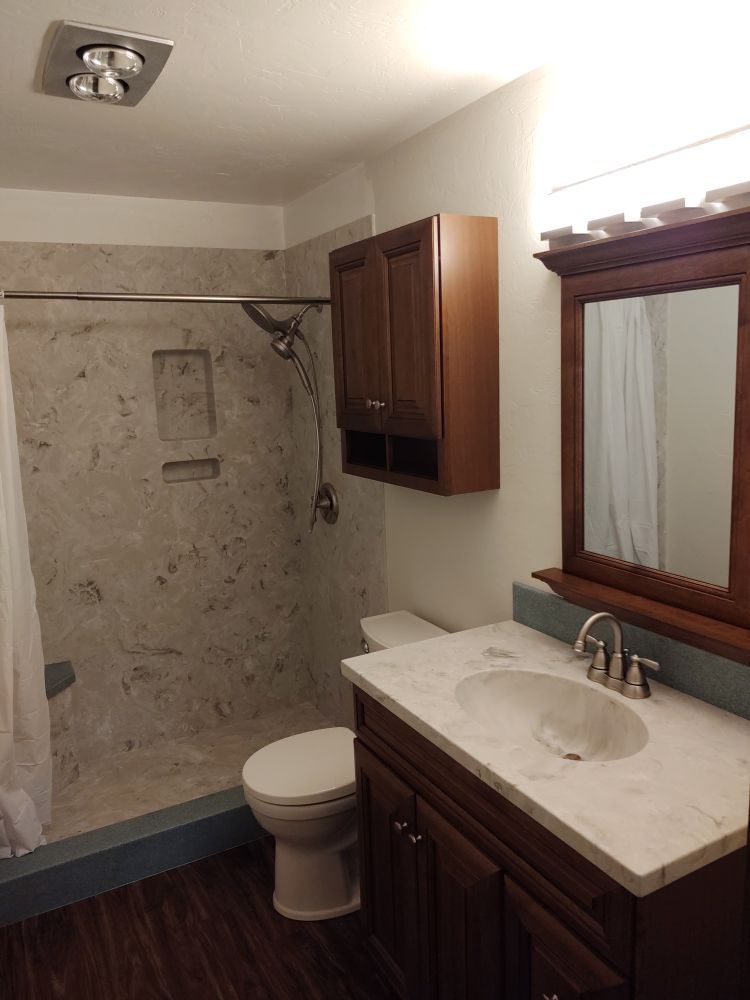 Slide of By Design Construction & Plumbing