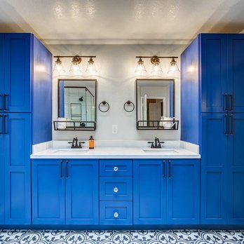 Denix Construction - a bathroom with blue cabinets - General Contractors Near Me - Glendale, Arizona