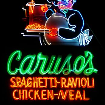 Caruso's - A wonderful sign outside beckons you in. - Pizza Near Me - Tucson, Arizona