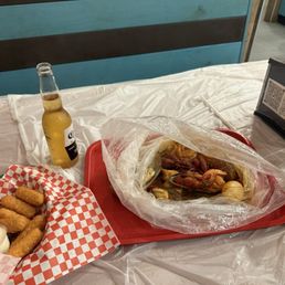 L1 Combination bag with shrimp, crawfish, and mussels  Cheese sticks (6)