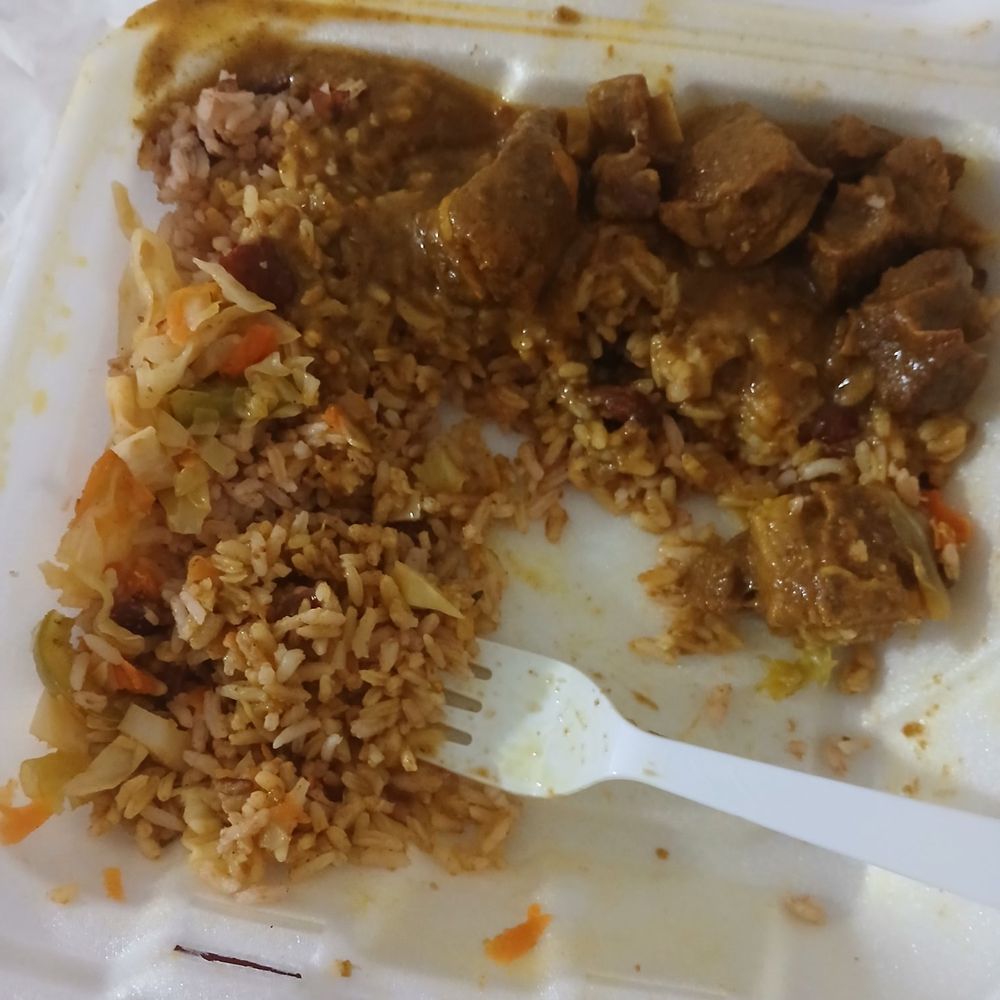 Dunns River Island Cafe Hallandale Beach - Curry goat dish that I was eating at my friend's house with her - Caribbean Near Me - Hallandale Beach, Florida Dunns River Island Cafe Hallandale Beach - Curry goat dish that I was eating at my friend's house with her - Caribbean Near Me - Hallandale Beach, Florida