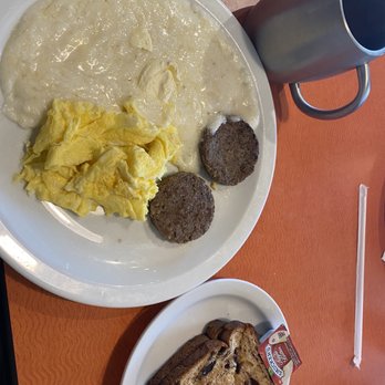 Sunny Side Up - Brunswick - Grits, two scrambled eggs, sausage and Raisin Bran toast with black coffee - Breakfast & Brunch Near Me - Brunswick, Georgia Sunny Side Up - Brunswick - Grits, two scrambled eggs, sausage and Raisin Bran toast with black coffee - Breakfast & Brunch Near Me - Brunswick, Georgia