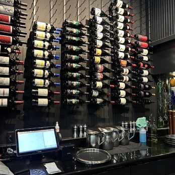 Table 26 - wine wall - New American Near Me - Turlock, California