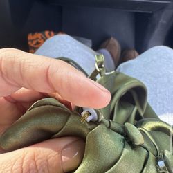 New buttons attached by the seamstress with mismatched thread