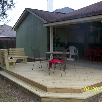 Renovation Systems - House repainted and new deck w/corner seat - General Contractors Near Me