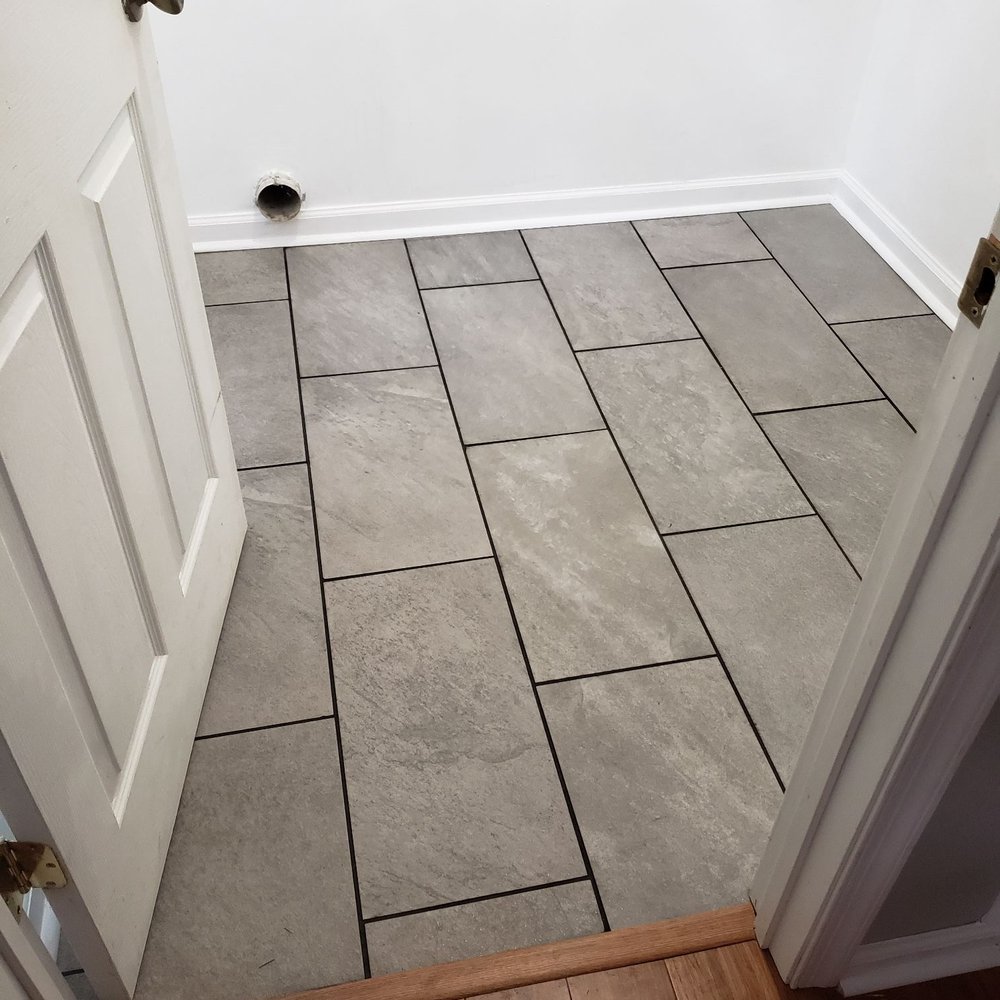 New tiles laid professionally and balanced.