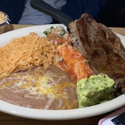 #31 Carne asada 8oz Rib eye tenderloin Enchilada Side of guacamole and pico Rice and Beans #31 Carne asada 8oz Rib eye tenderloin Enchilada Side of guacamole and pico Rice and Beans