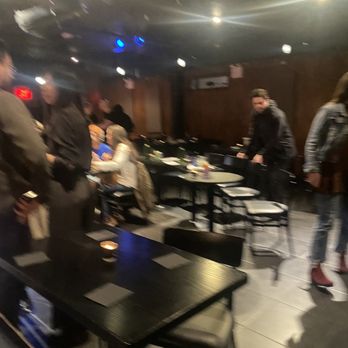 West Side Comedy Club - a group of people sitting at tables - Comedy Clubs Near Me - New York, New York West Side Comedy Club - a group of people sitting at tables - Comedy Clubs Near Me - New York, New York