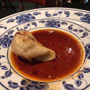 David's Kitchen - One of their Pot Stickers with their mild sauce. - Chinese Near Me - Salt Lake City, Utah David's Kitchen - One of their Pot Stickers with their mild sauce. - Chinese Near Me - Salt Lake City, Utah